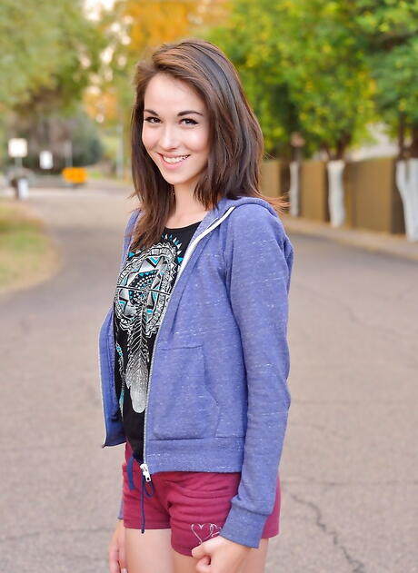 Foxy american brunette teen Emily Grey in sexy shorts revealing tiny tits and hot ass outdoor